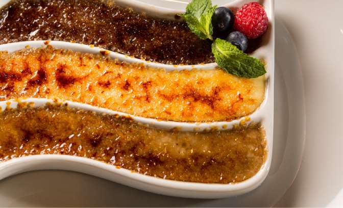 Verschillende Creme brulee op de MS Prinsendam